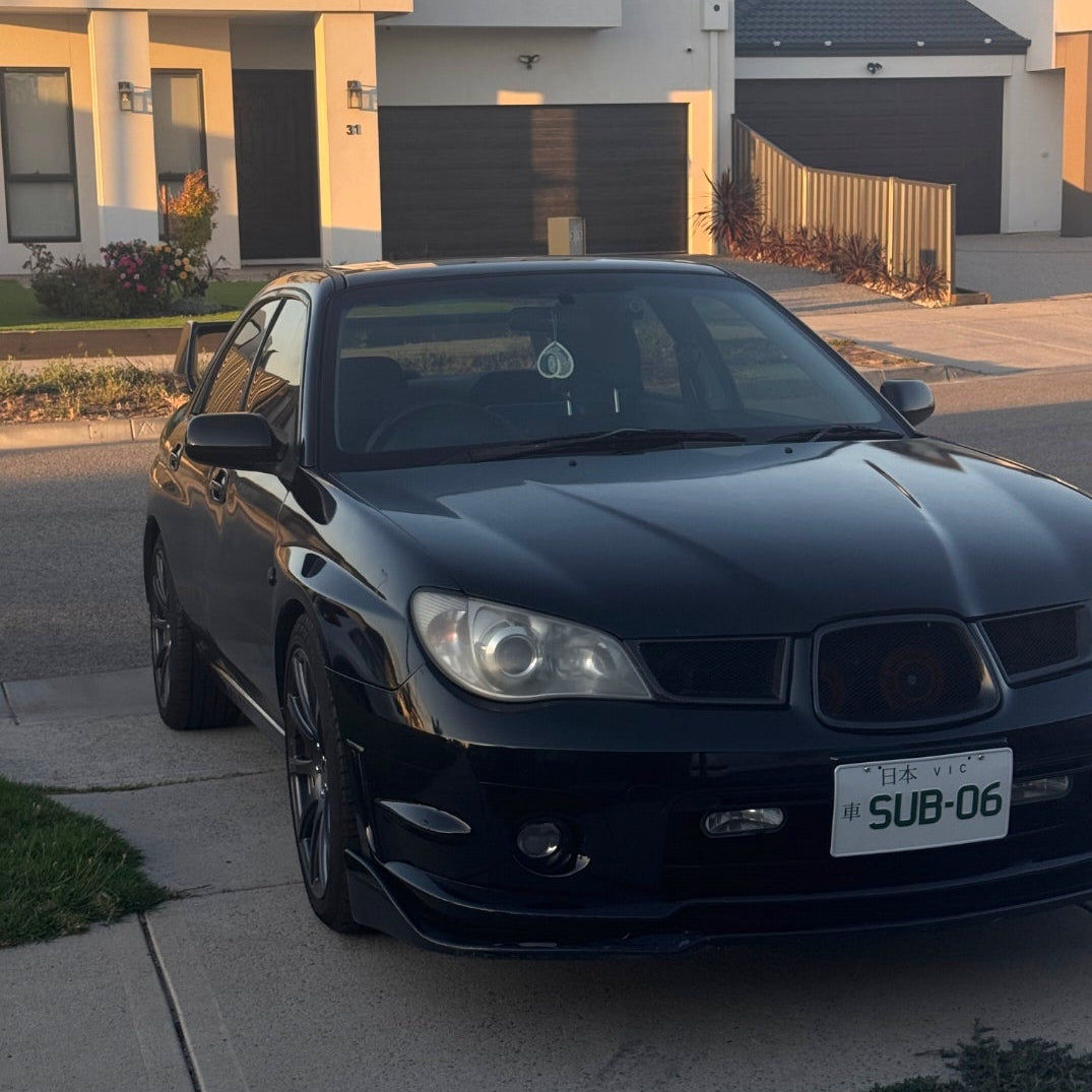 Subaru with Burnout Fat Ass Air freshener 
